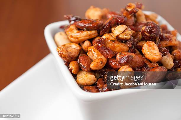bacon-maple spiced nuts - pecan nut stock pictures, royalty-free photos & images