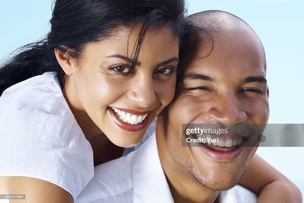 Closeup image of a happy romantic young couple