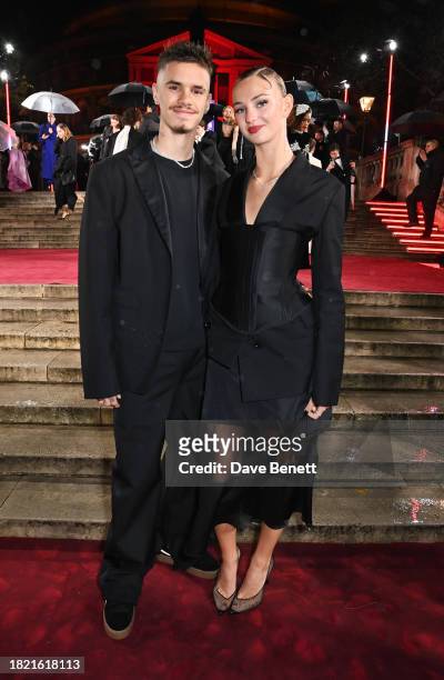 Romeo Beckham and Mia Regan attend The Fashion Awards 2023 presented by Pandora at The Royal Albert Hall on December 4, 2023 in London, England.
