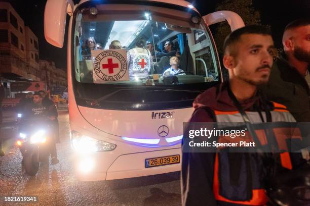 Bus carrying a group of 30 freed Palestinian prisoners makes its way into the city center after they were released from Israeli prison on November...