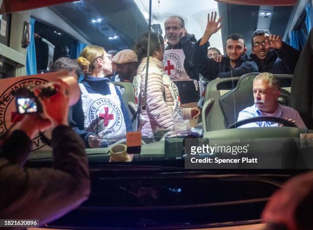 Bus carrying a group of 30 freed Palestinian prisoners makes its way into the city center after they were released from Israeli prison on November...