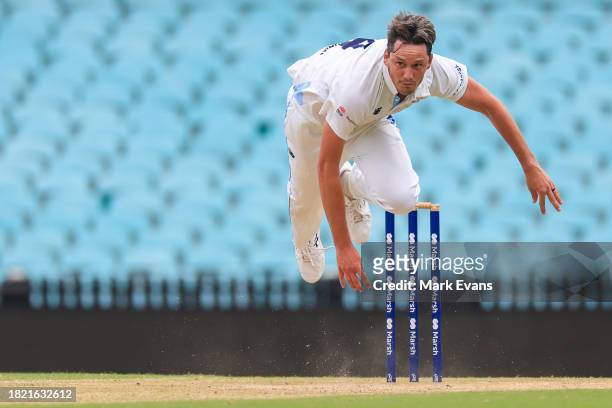 Chris Tremain of the Blues bowls during the Sheffield Shield match between New South Wales and Tasmania at SCG, on November 30 in Sydney, Australia.
