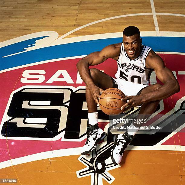 David Robinson of the San Antonio Spurs poses for a portrait at the Alamodome during the 1996 season in San Antonio, Texas. NOTE TO USER: User...