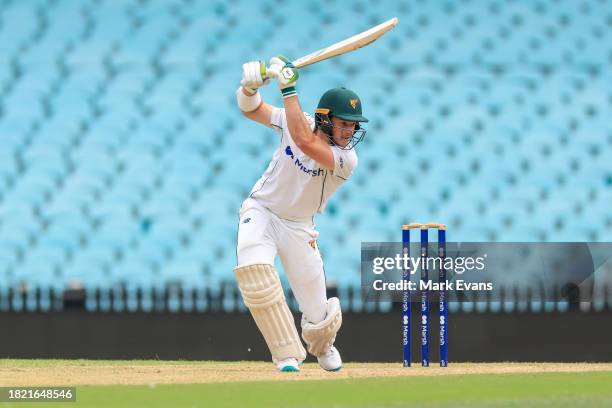 Tim Ward of the Tigers hits a boundary during the Sheffield Shield match between New South Wales and Tasmania at SCG, on November 30 in Sydney,...