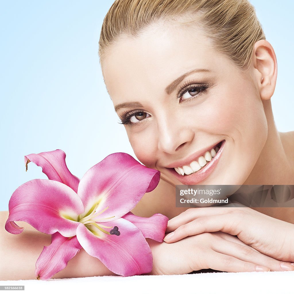 Smiling Woman With Flower