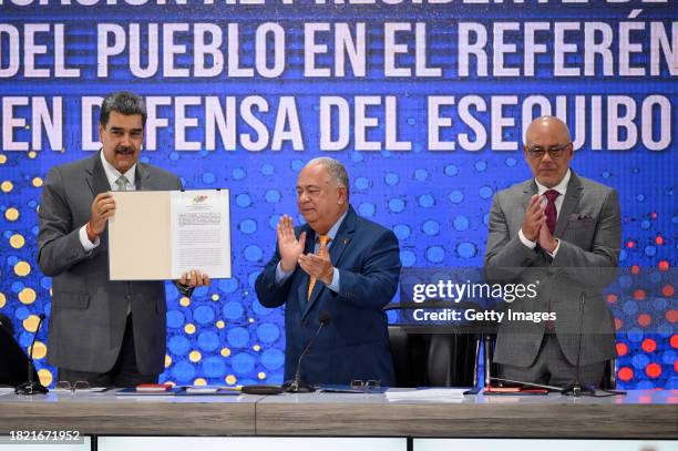 President of Venezuela Nicolas Maduro, Rector of the National Electoral Council Elvis Amoroso and President of the National Assembly Jorge Rodriguez,...