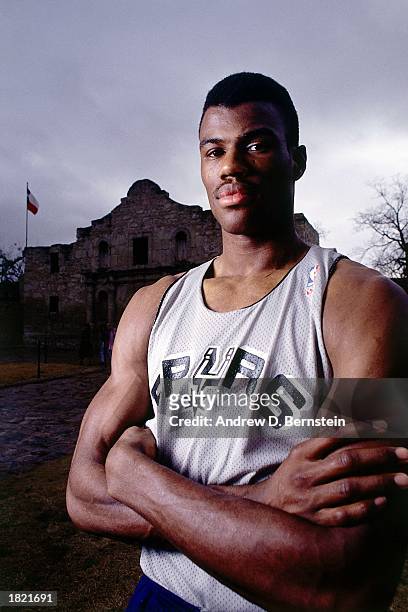 David Robinson of the San Antonio Spurs poses for a portrait in front of the Alamo during the 1989 season in San Antonio, Texas. NOTE TO USER: User...