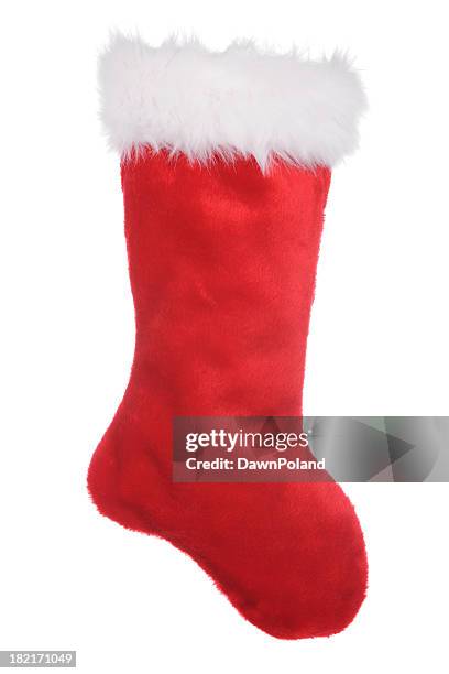 red sock for christmas time to put presents into - stockings stock pictures, royalty-free photos & images