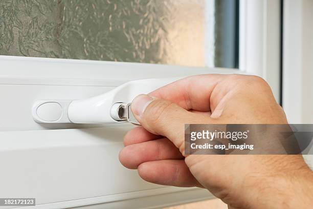 locking a window lock - lock out stock pictures, royalty-free photos & images