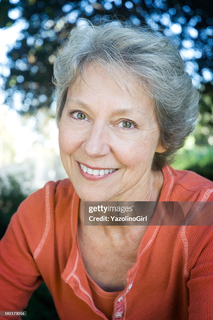 Portrait of a smiling senior woman looking at the camera