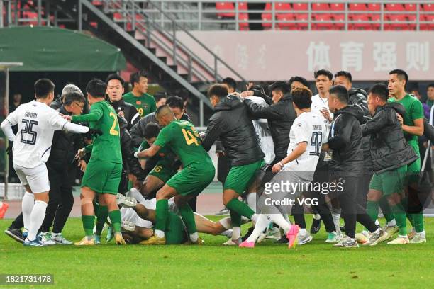 Players of Zhejiang FC argue with players of Buriram United during the AFC Champions League Group H match between Zhejiang FC and Buriram United at...