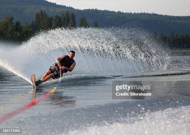 mid forties male waterskiing - waterskiing stock pictures, royalty-free photos & images