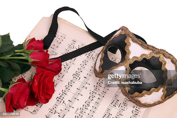 venetian mask, notes and flower. - masquerade ball stock pictures, royalty-free photos & images