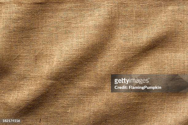 burlap fabric with wrinkles, wide shot. full frame. - fabric full frame stock pictures, royalty-free photos & images