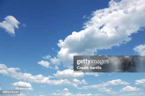 Photo of some white whispy clouds and blue sky cloudscape Photo of some white whispy clouds and blue sky cloudscape