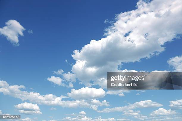 photo of some white whispy clouds and blue sky cloudscape - spring weather stock pictures, royalty-free photos & images