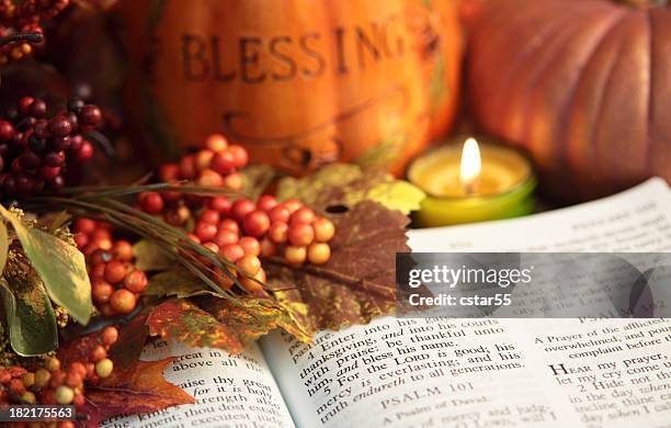 religious: thanksgiving bible scripture with pumpkin and berries - christianity stock pictures, royalty-free photos & images
