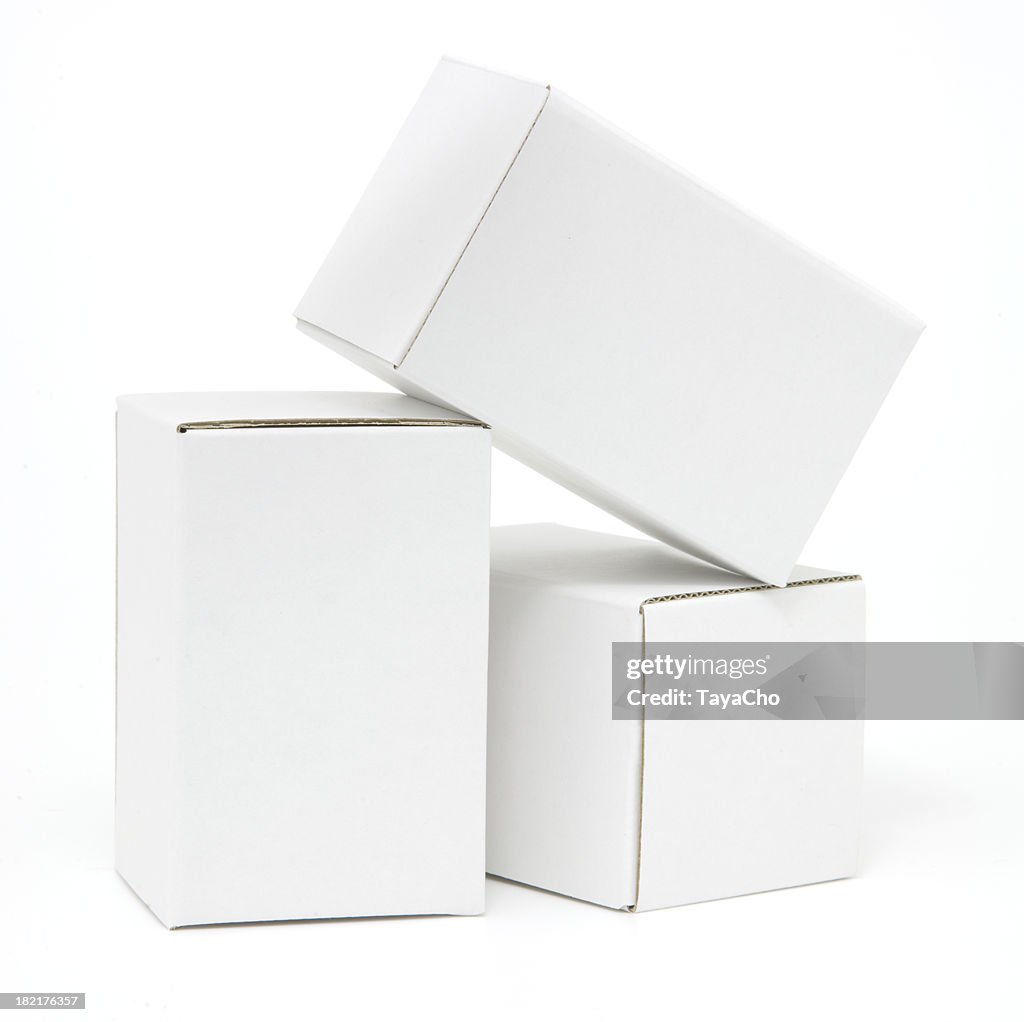 Three tall white cartons isolated