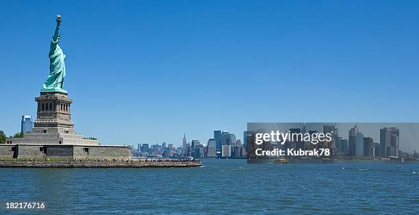 the new york skyline and statue of liberty from the river - new york harbour stock pictures, royalty-free photos & images