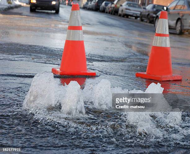 street flooding. - leaking stock pictures, royalty-free photos & images