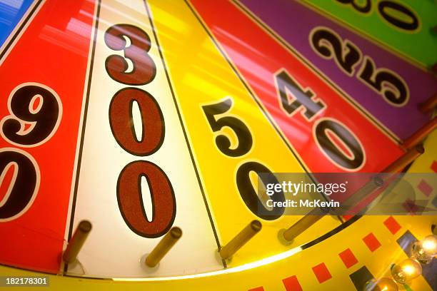 win 300 points on a wheel of fortune - wheel of fortune stock pictures, royalty-free photos & images