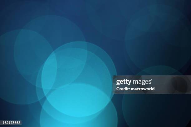 blue background with overlapping circles of shades of blue  - circle texture stock pictures, royalty-free photos & images