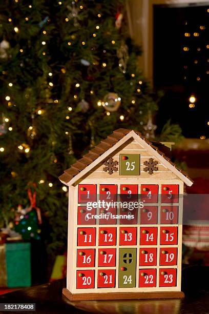 advent calendar - child with advent calendar stock pictures, royalty-free photos & images