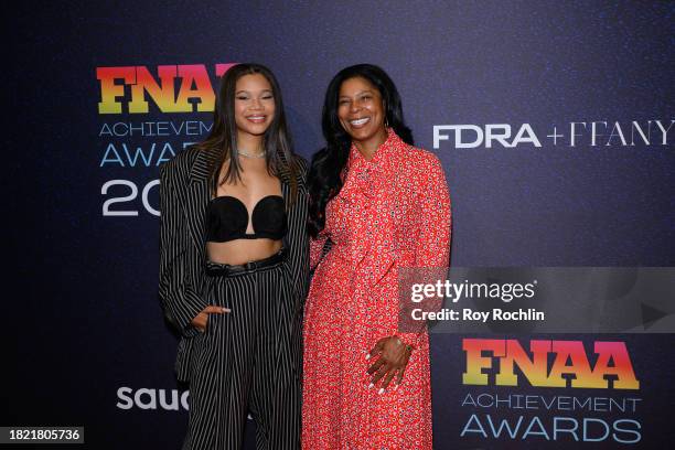 Storm Reid and Robyn Simpson Reid attend the 37th Annual Footwear News Achievement Awards at Cipriani South Street on November 29, 2023 in New York...