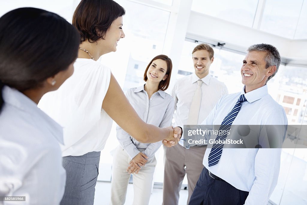 Firm handshake between business associates