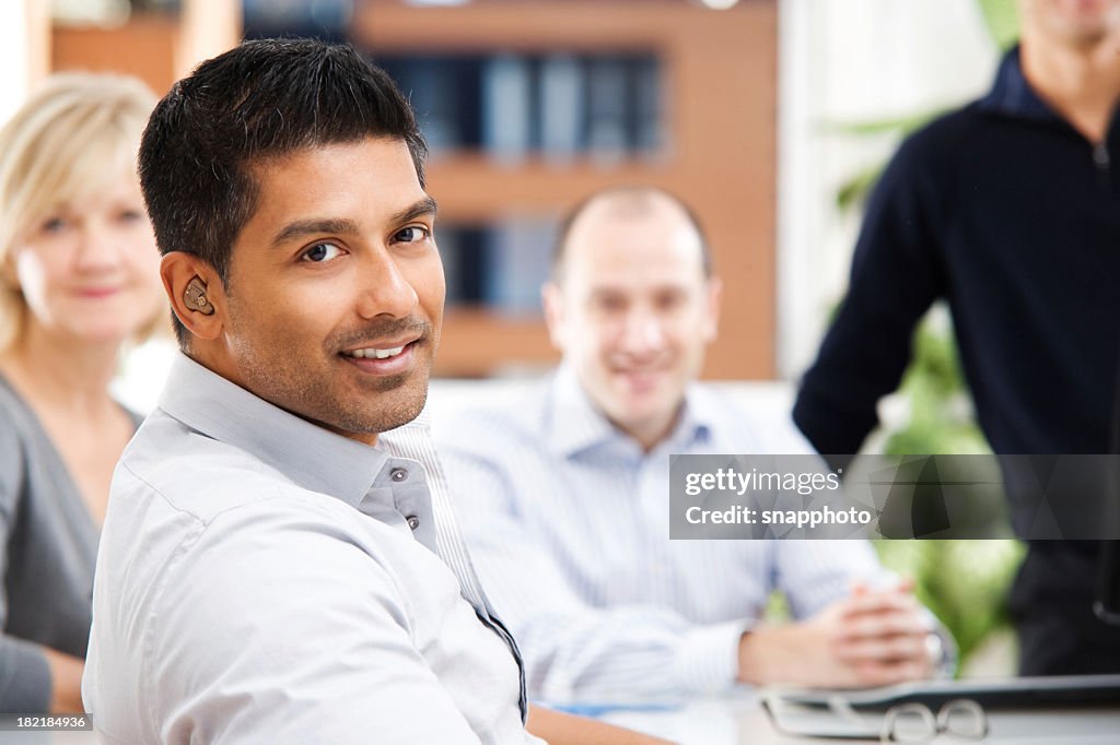 A group of people in business casual dress