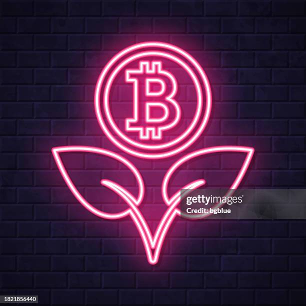 growing bitcoin. glowing neon icon on brick wall background - purple flower wall stock illustrations