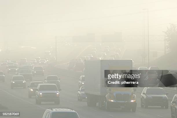 rush hour smog - air pollution stock pictures, royalty-free photos & images
