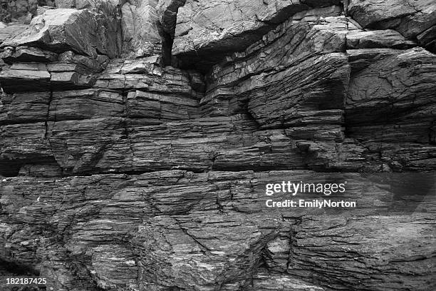 large textured rock wall that would be suitable for climbers - shale stock pictures, royalty-free photos & images