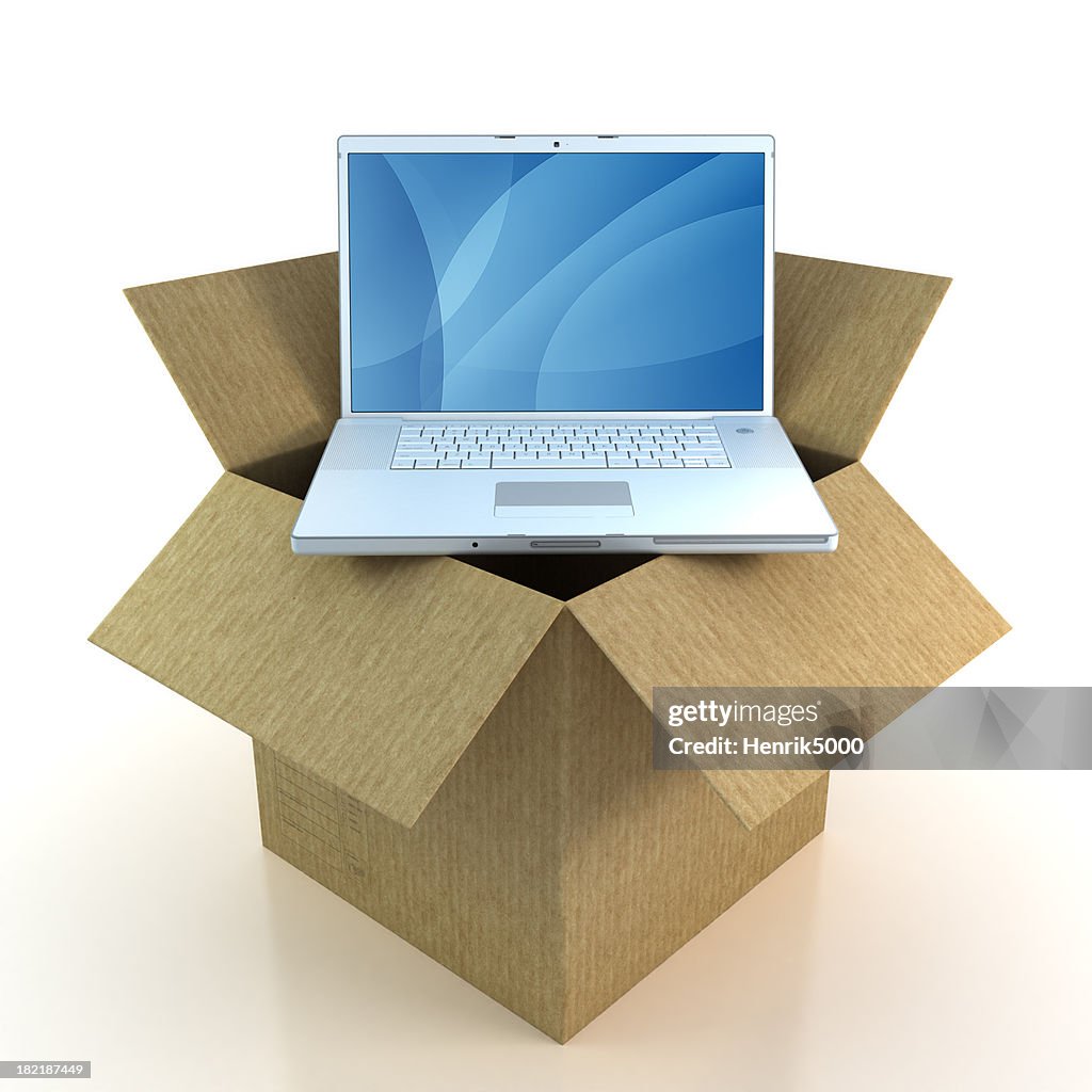 Laptop in cardboard box - isolated with Clipping Path