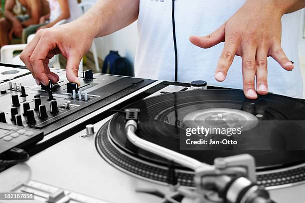 dj on turntable - disk jockey stock pictures, royalty-free photos & images