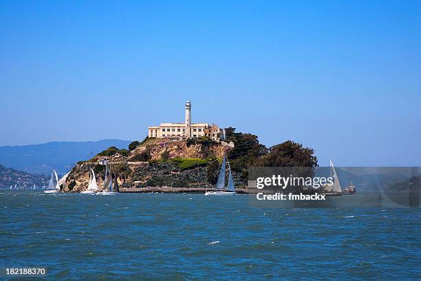 a gorgeous view of the ocean around alcatraz island - alcatraz stock pictures, royalty-free photos & images