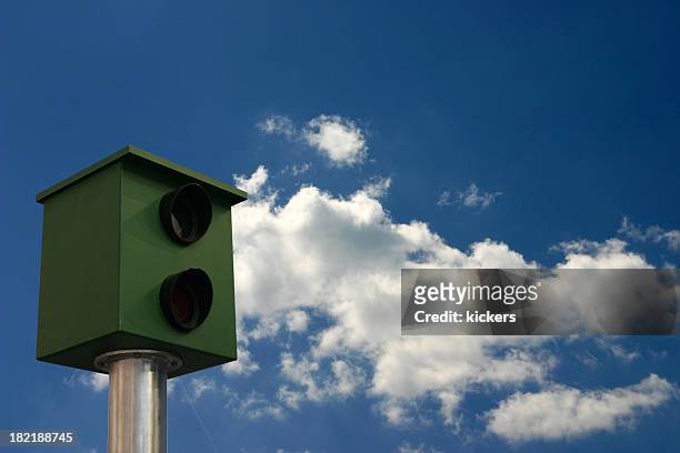 speed camera in summer sky - glitzer stock pictures, royalty-free photos & images