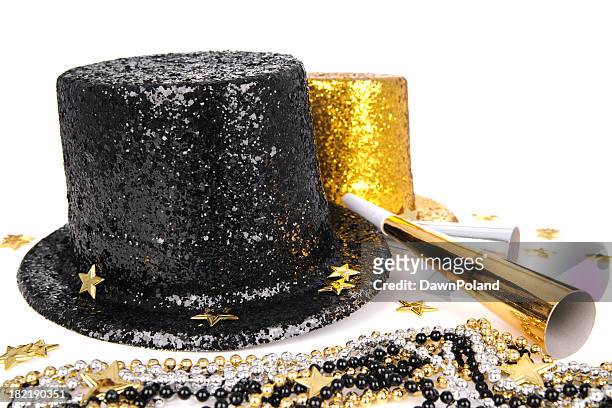 party hats and supplies - party horn blower stock pictures, royalty-free photos & images