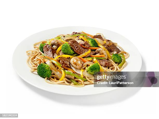 szechuan beef with noodles - chinese food stock pictures, royalty-free photos & images