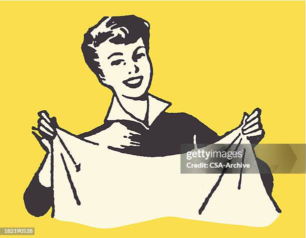 smiling woman holding sheet - housewife stock illustrations