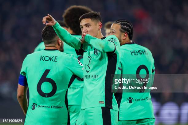 Players of Atletico Madrid celebrates after scoring the 1:3 goal during the UEFA Champions League match between Feyenoord and Atletico Madrid at...