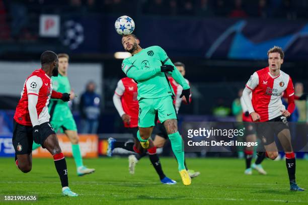 Memphis Depay of Atletico Madrid Controlls the ball during the UEFA Champions League match between Feyenoord and Atletico Madrid at Feyenoord Stadium...