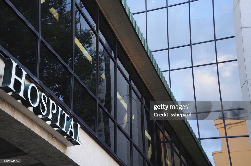 Modern building with hospital sign