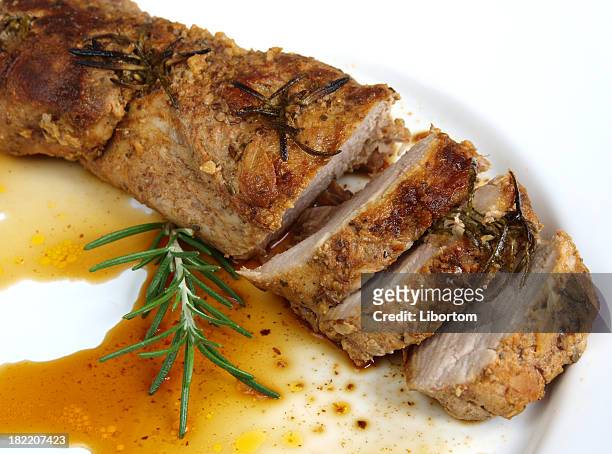 a plate of roasted pork sirloin - pork tenderloin stock pictures, royalty-free photos & images