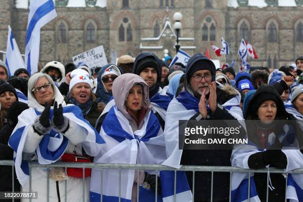 Demonstrators gather in support of the Jewish community, on Parliament Hill in Ottawa, Ontario, Canada, on December 4, 2023. Israeli police say they...