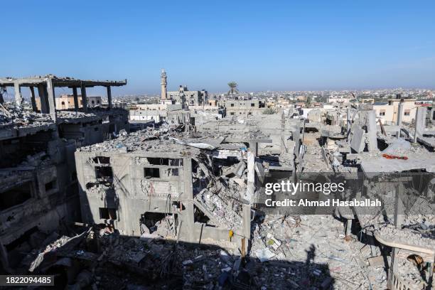 The effects of destruction caused by air strikes on homes seen on November 30, 2023 in Khan Yunis, Gaza. A temporary ceasefire between Israel and...