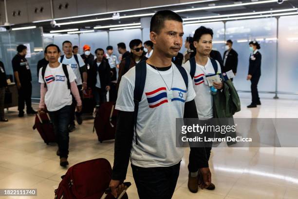 Released Thai hostages arrive to Bangkok's Suvarnabhumi Airport on November 30, 2023 in Bangkok, Thailand. Seventeen out of the 23 Thai hostages, who...