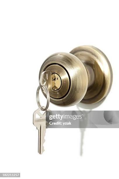 türgriff mit schlüssel - doorknob stock-fotos und bilder