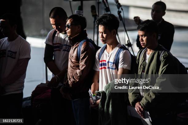 Thai nationals who had been kidnapped by Hamas militants on October 7th give a press conference after their release at Suvarnabhumi Airport on...