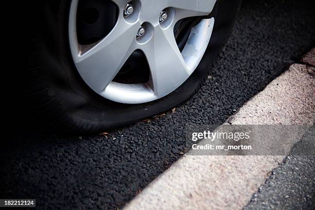 flat car tire - flat tyre stock pictures, royalty-free photos & images